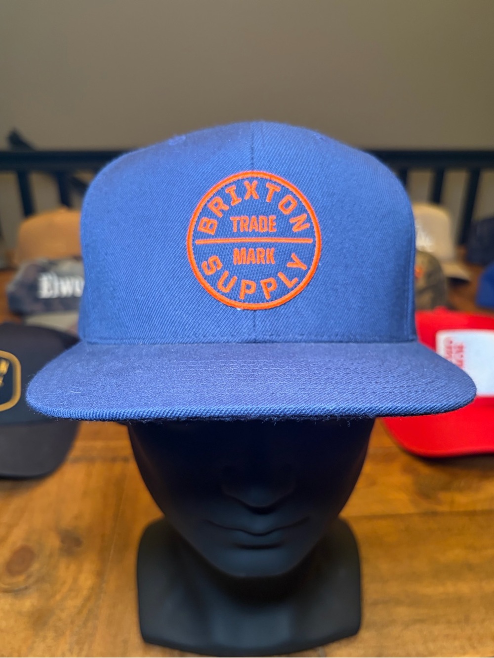Brixton Blue Snapback with Orange Circle Logo